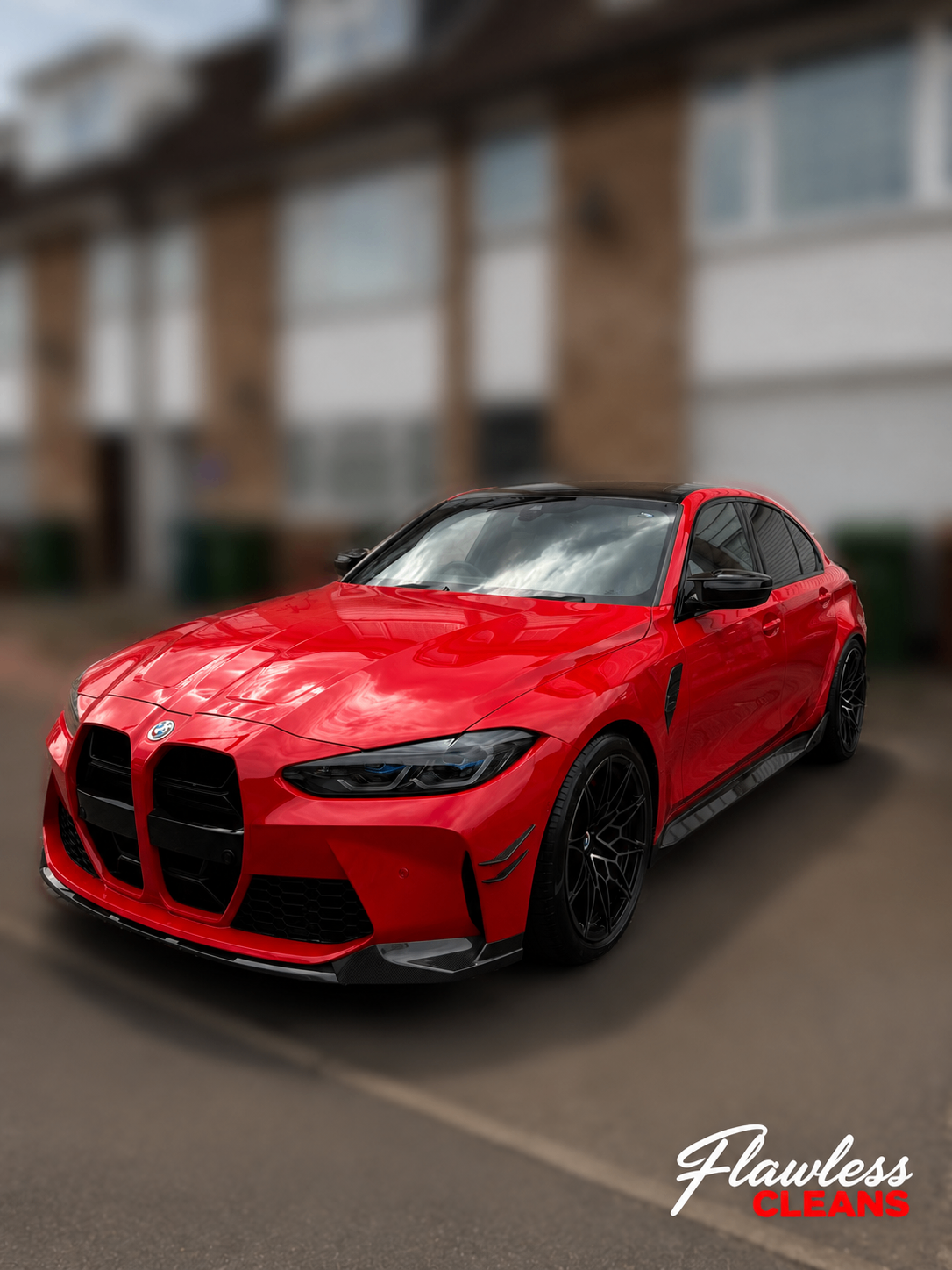Red BMW M3 Competition with deep gloss paint finish