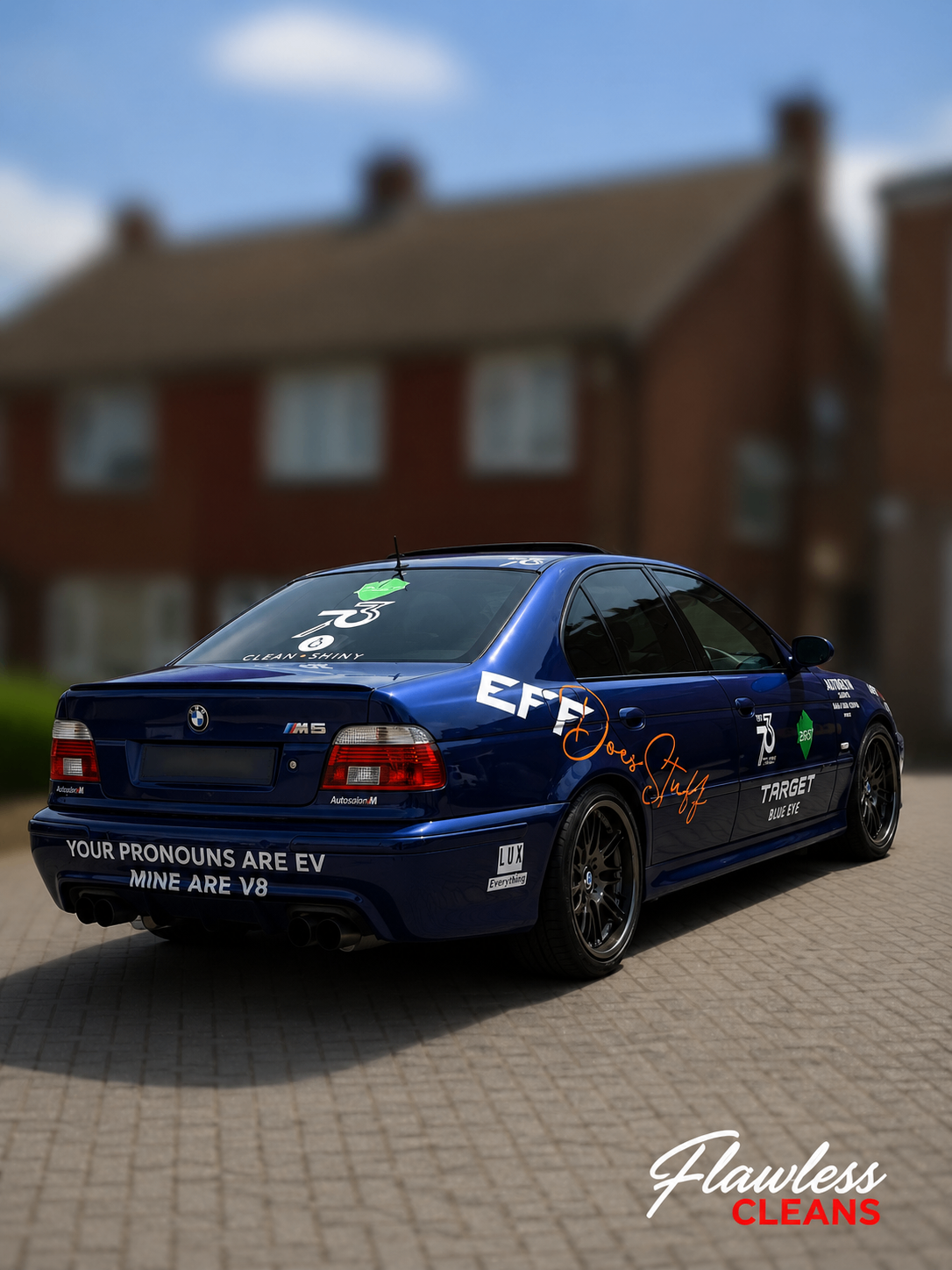 Blue BMW E39 M5 detailed on a block-paved driveway